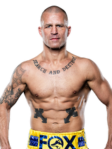 Gary Fox with yellow shorts that display the text "FOX"