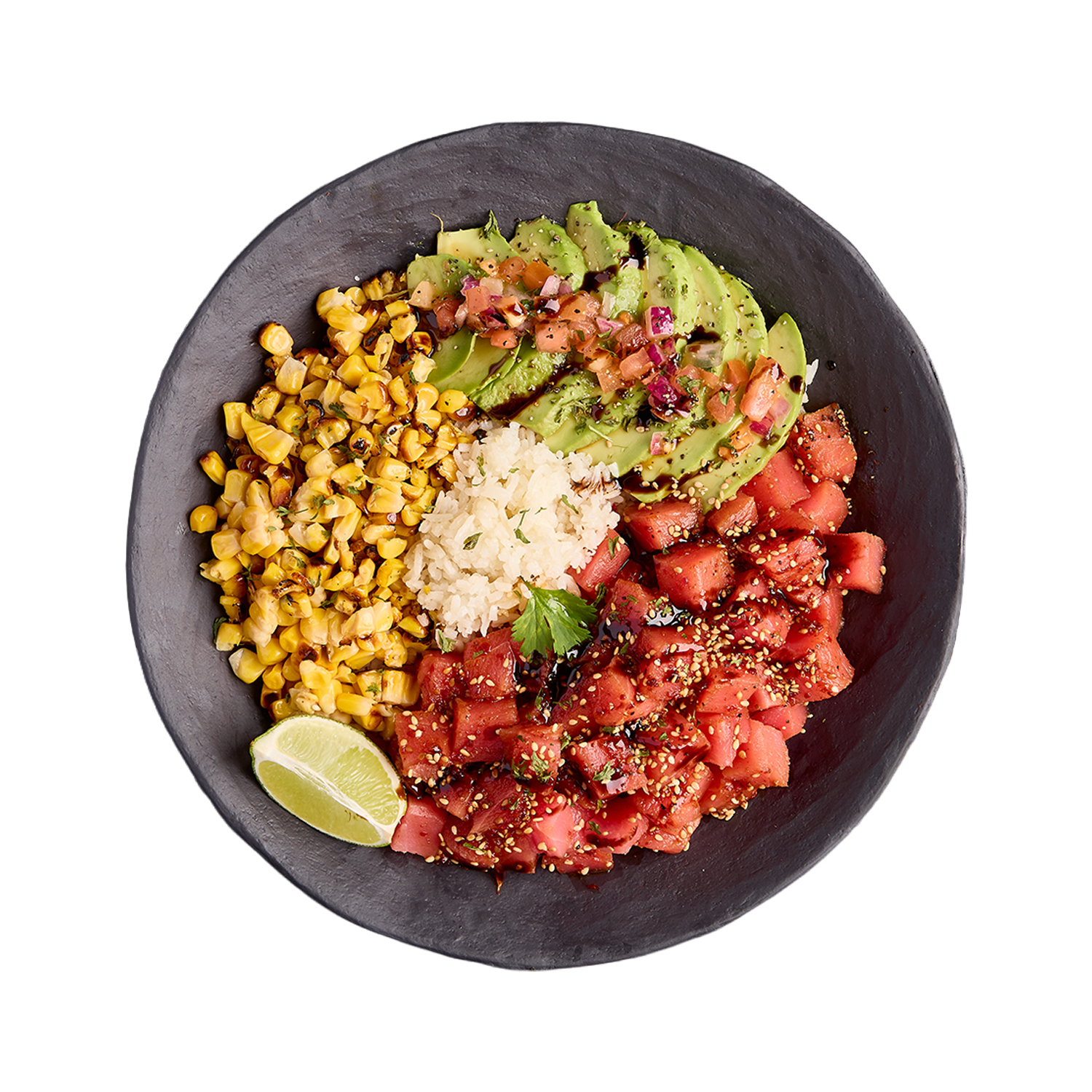 Plated dish with various ingredients including corn, avocado, and tuna on a white background